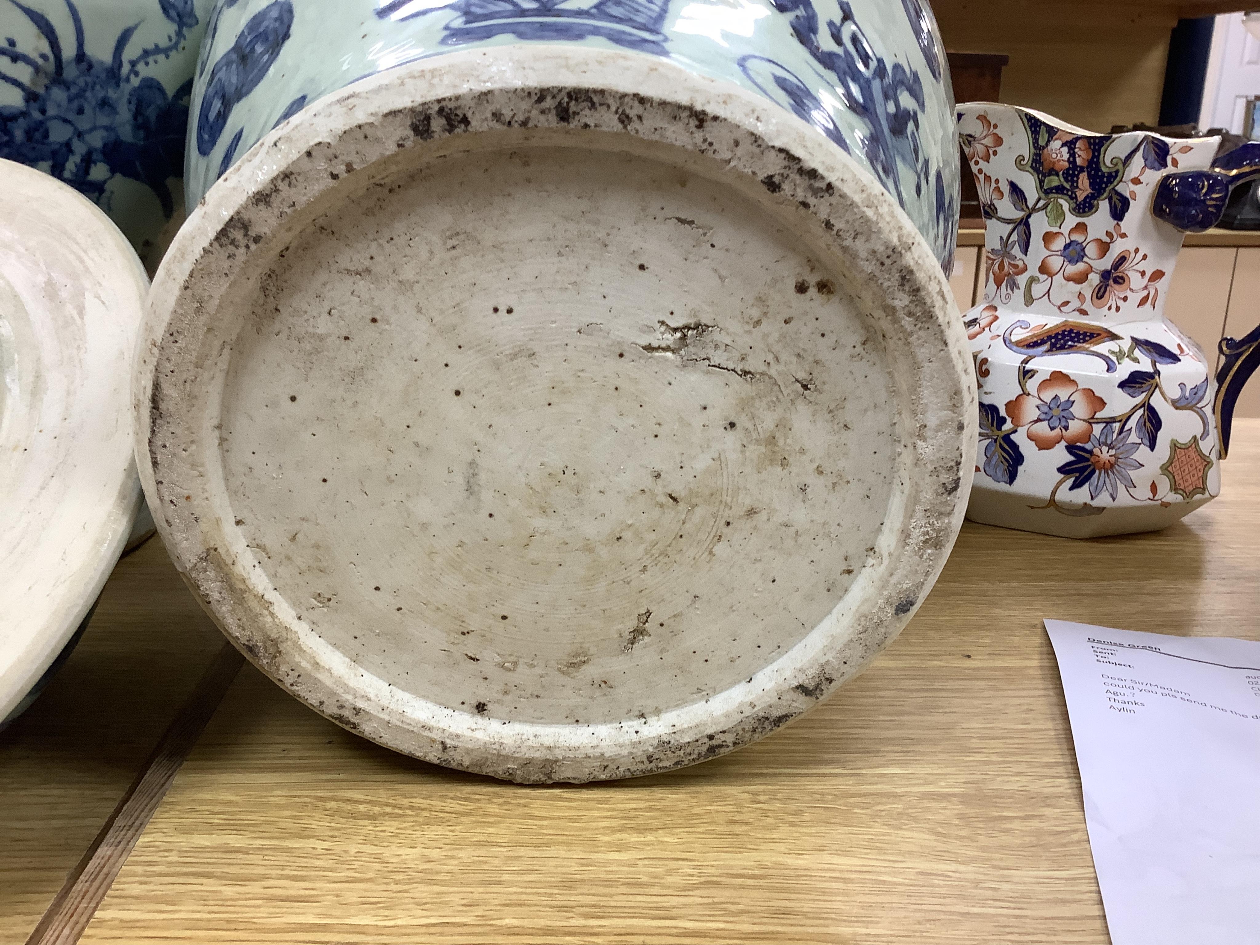 A large pair of Chinese blue and white ginger jars and covers, 54cm high. Condition - fair to good